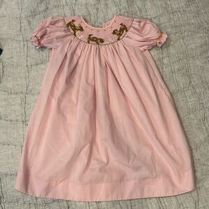 Pink smocked dress excellent condition.  Like new.  Size 2T